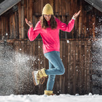 happy woman wearing Après All Day Boots in snow (7266281291960)