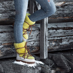 woman wearing yellow Après All Day Boots with jeans (7266281291960)