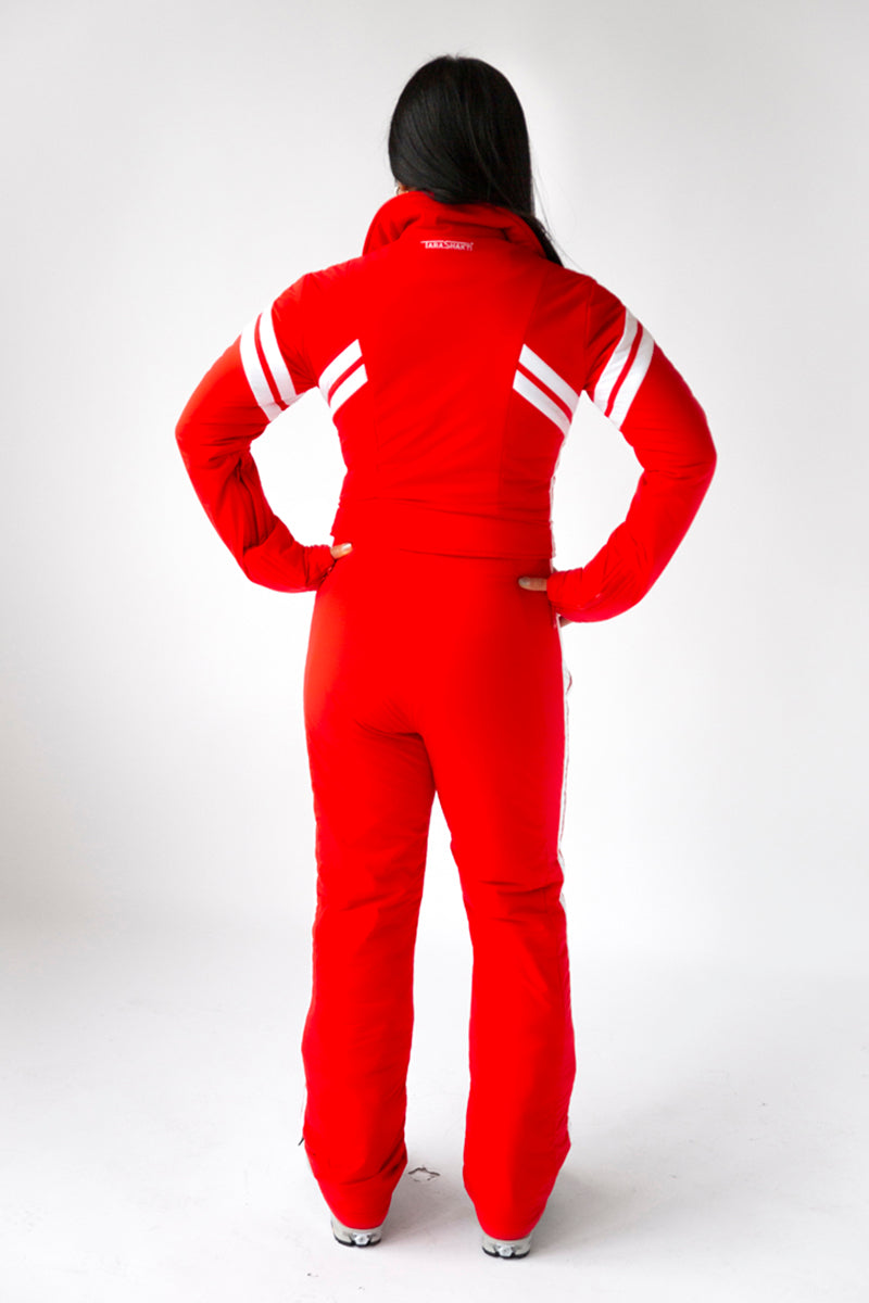 back view model wearing tara shakti one-piece ski suit farrah variant red white (7313799938232)