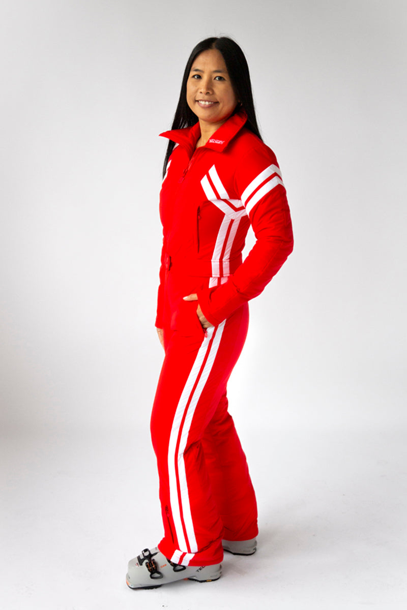 side view model wearing tara shakti one-piece ski suit farrah variant red white (7313799938232)