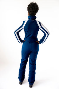 back view model wearing tara shakti one-piece ski suit Raquel variant white dark blue (7313802821816)