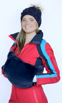 happy woman wearing designer tara shakti one-piece snow suit beanie faux fur fanny pack (7228685615288)