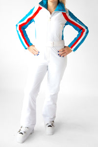 front view model wearing tara shakti one-piece ski suit Brandy variant white red light blue (7313802920120)