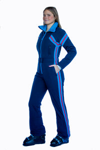 side view model wearing tara shakti one-piece ski suit bonnie variant dark blue red (7232644907192)