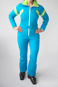 front view model wearing tara shakti one-piece ski suit jackie variant light blue green