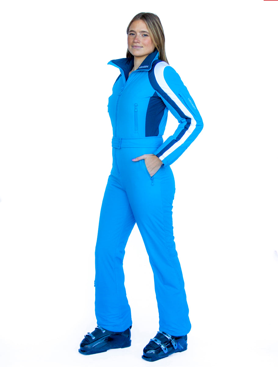 front view model wearing tara shakti one-piece ski suit Tina variant light blue white (7232648511672)